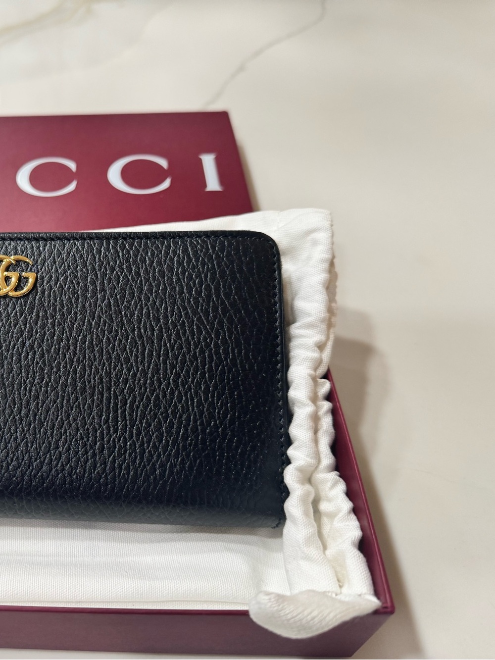 Gucci Black Pebbled Leather Zip Wallet with Gold Logo